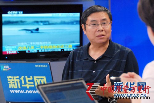 金中夏：匯率政策方向?qū)⒏嗟赜墒袌?chǎng)決定